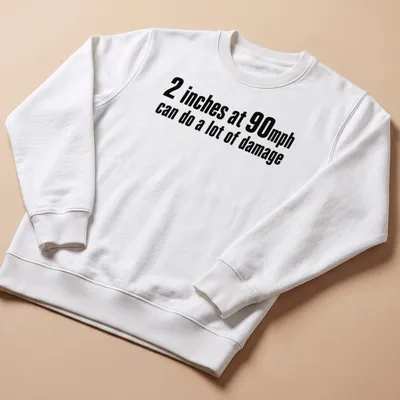 Bold typography shirt with speed humor about inches and mph — printed on a unisex sweatshirt