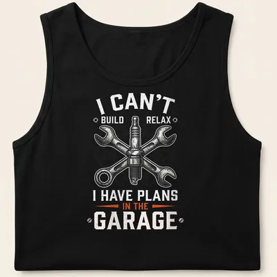 Vintage mechanical t-shirt featuring spark plug and wrenches with humorous text — printed on a tank top