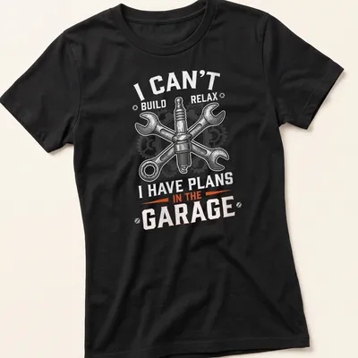 Vintage mechanical t-shirt featuring spark plug and wrenches with humorous text — printed on a women's shirt