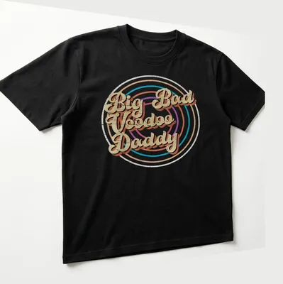 Bold geometric design with Big Bad Voodoo Daddy text in retro colors. — printed on a unisex t-shirt (angled view)