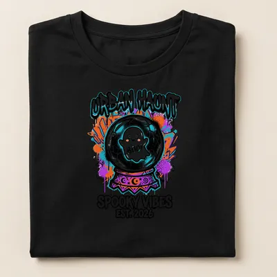 Colorful graffiti print of a ghost in a cracked crystal ball with text — printed on a women's shirt