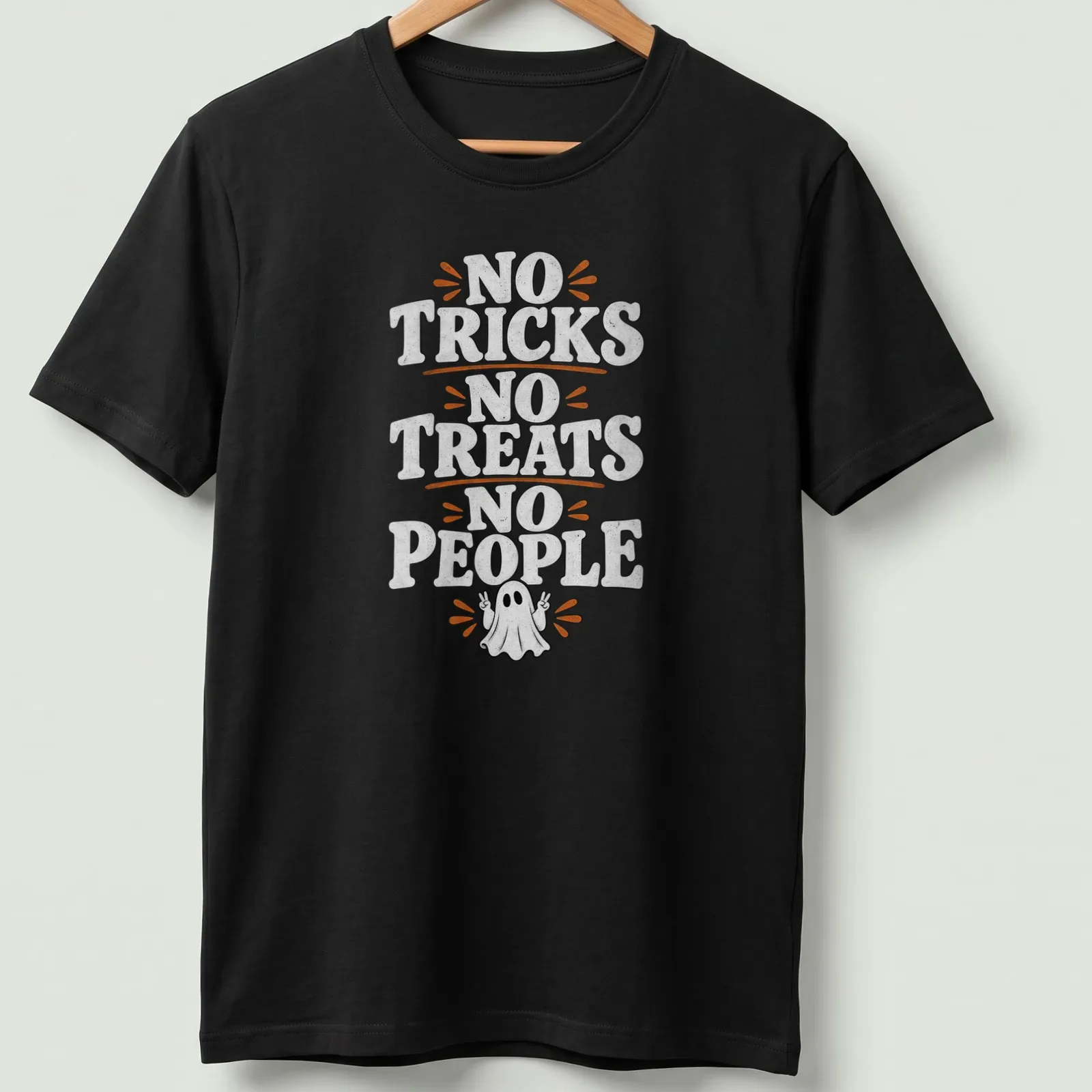 Playful cartoon ghost t-shirt with the text 'No Tricks No Treats No People' in black and orange — printed on a unisex t-shirt