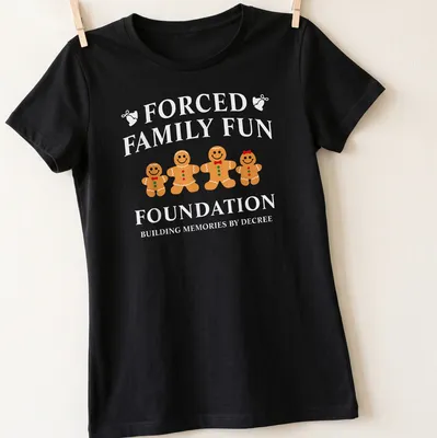 Playful gingerbread cookies illustration with humorous text about family fun — printed on a women's shirt