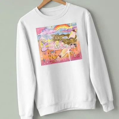 Whimsical watercolor print of a girl flying with a white plane and rainbow — printed on a unisex sweatshirt