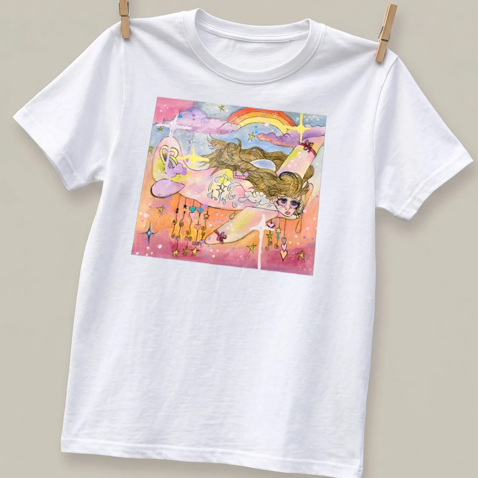 Whimsical watercolor print of a girl flying with a white plane and rainbow — printed on a unisex t-shirt