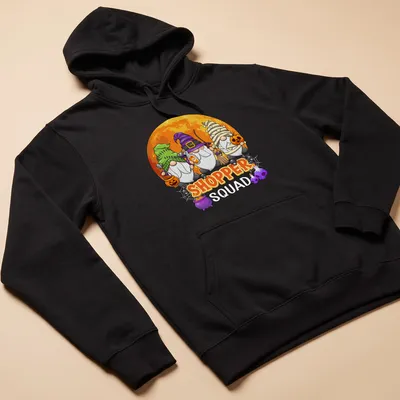 Cartoon gnomes surrounding the word 'SHOPPER' in vibrant Halloween colors — printed on a unisex hoodie