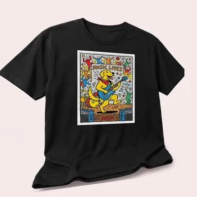 Pop art Golden Retriever playing guitar with 'MUSIC LIVES' text — printed on a unisex t-shirt (angled view)