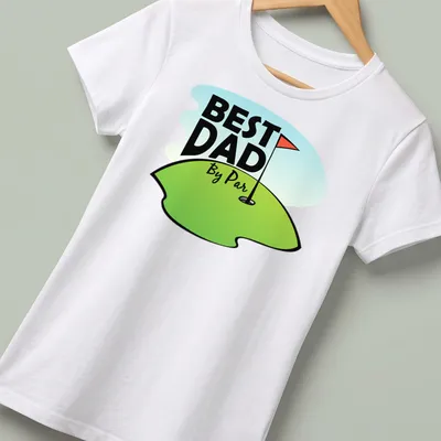 Cartoon design featuring a golf hole with a flag and text reading Best Dad By Par — printed on a women's shirt