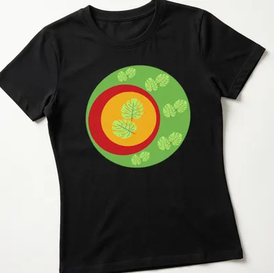 Flat design t-shirt featuring Monstera leaves in green, yellow, and red — printed on a women's shirt