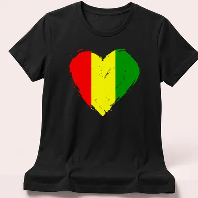 Distressed Guinea flag heart design in red, yellow, and green — printed on a women's shirt