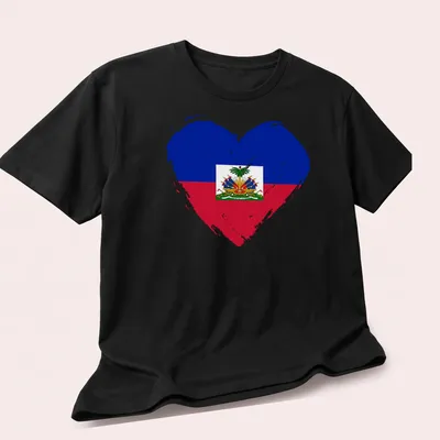 Distressed print of the Haiti flag in a heart shape with blue, red, green, and yellow colors. — printed on a unisex t-shirt (angled view)