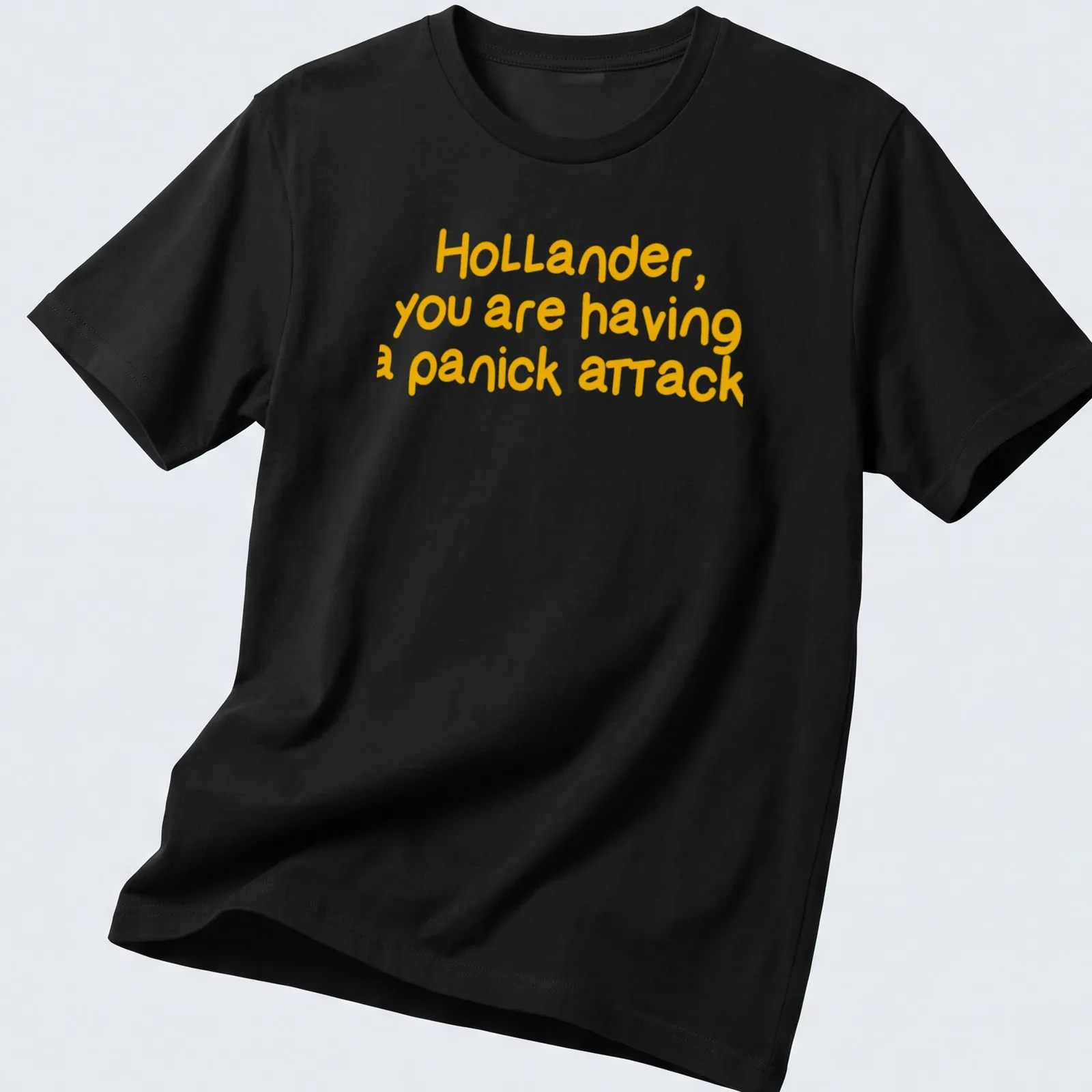 Bold typography t-shirt with humorous text about a panic attack — printed on a unisex t-shirt