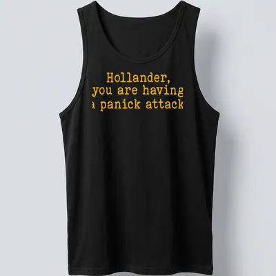Bold yellow text on a t-shirt reads 'Hollander, you are having a panick attack' in playful typography — printed on a tank top