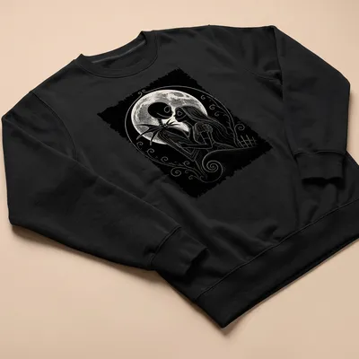 Gothic illustration of Jack and Sally embracing under a moonlit sky in black, white, and gray — printed on a unisex sweatshirt