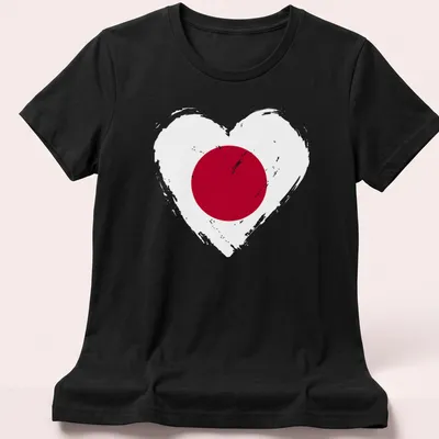 Distressed heart design featuring the Japan flag in red and white — printed on a women's shirt