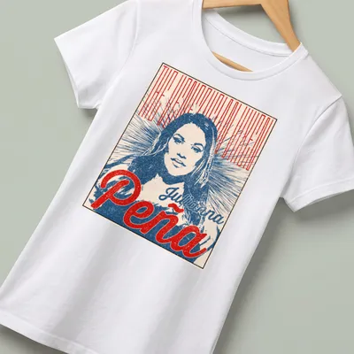 Vintage poster style t-shirt featuring Julianna Peña as 'The Venezuelan Vixen' in red, blue, and cream — printed on a women's shirt