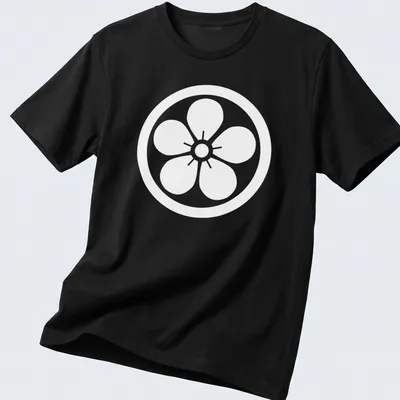 Kamon emblem printed on a T-shirt representing Japanese heritage.