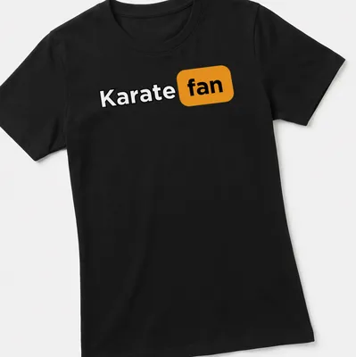 Bold Karate Fan T-Shirt with modern typography in black, orange, and white — printed on a women's shirt