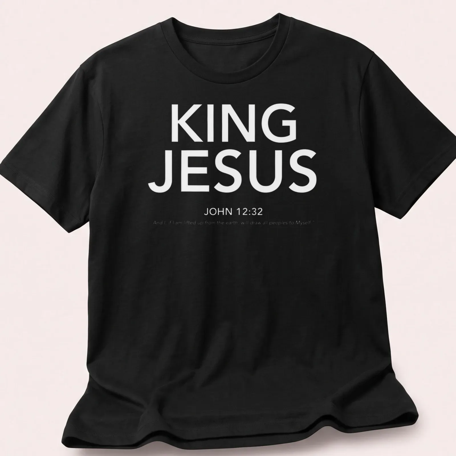 White text T-shirt featuring King Jesus John 1232 in a simple design — printed on a unisex t-shirt