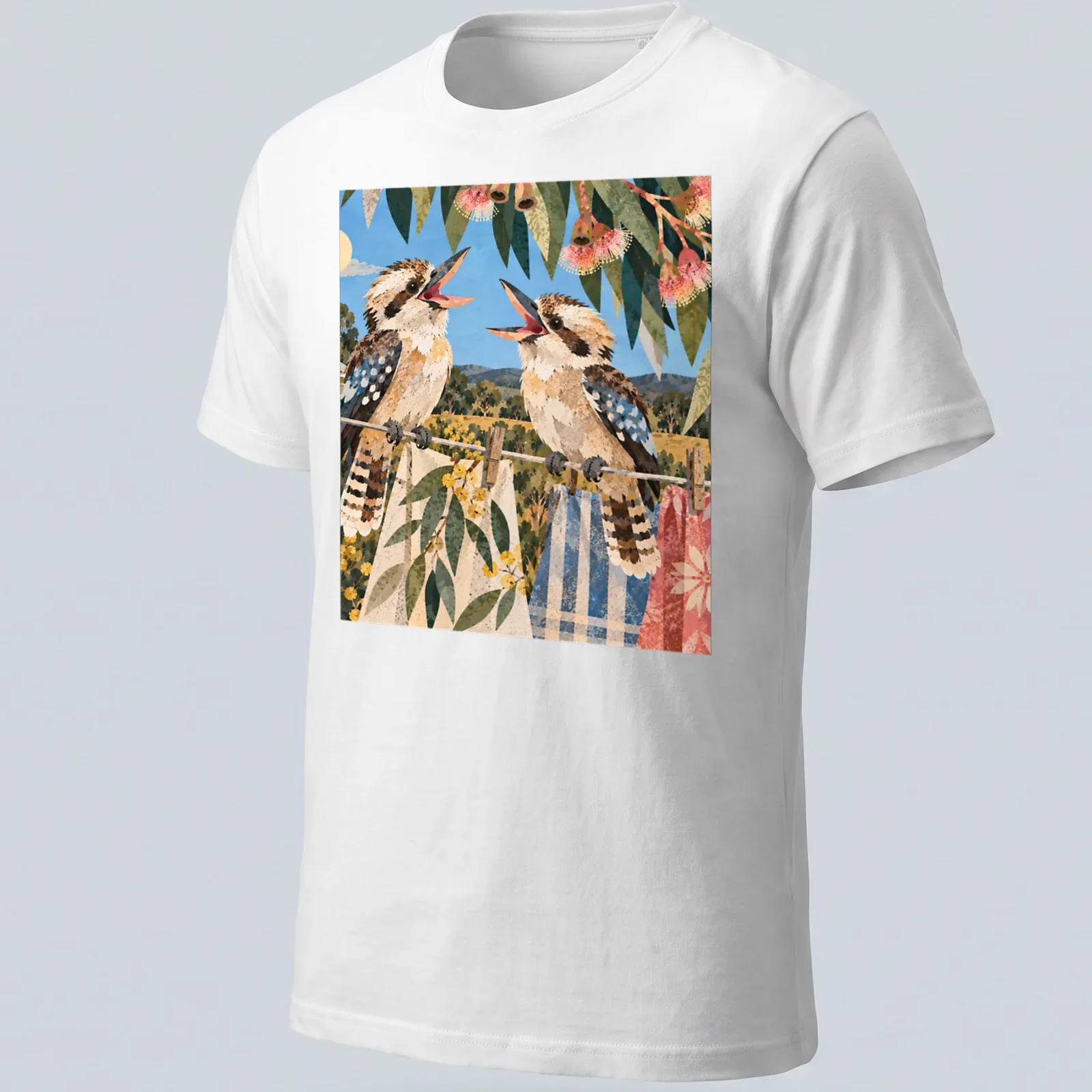 Vintage illustrated t-shirt featuring laughing kookaburras in soft colors — printed on a unisex t-shirt