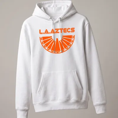 Bold geometric L.A. Aztecs soccer tee featuring an eagle emblem in orange. — printed on a unisex hoodie