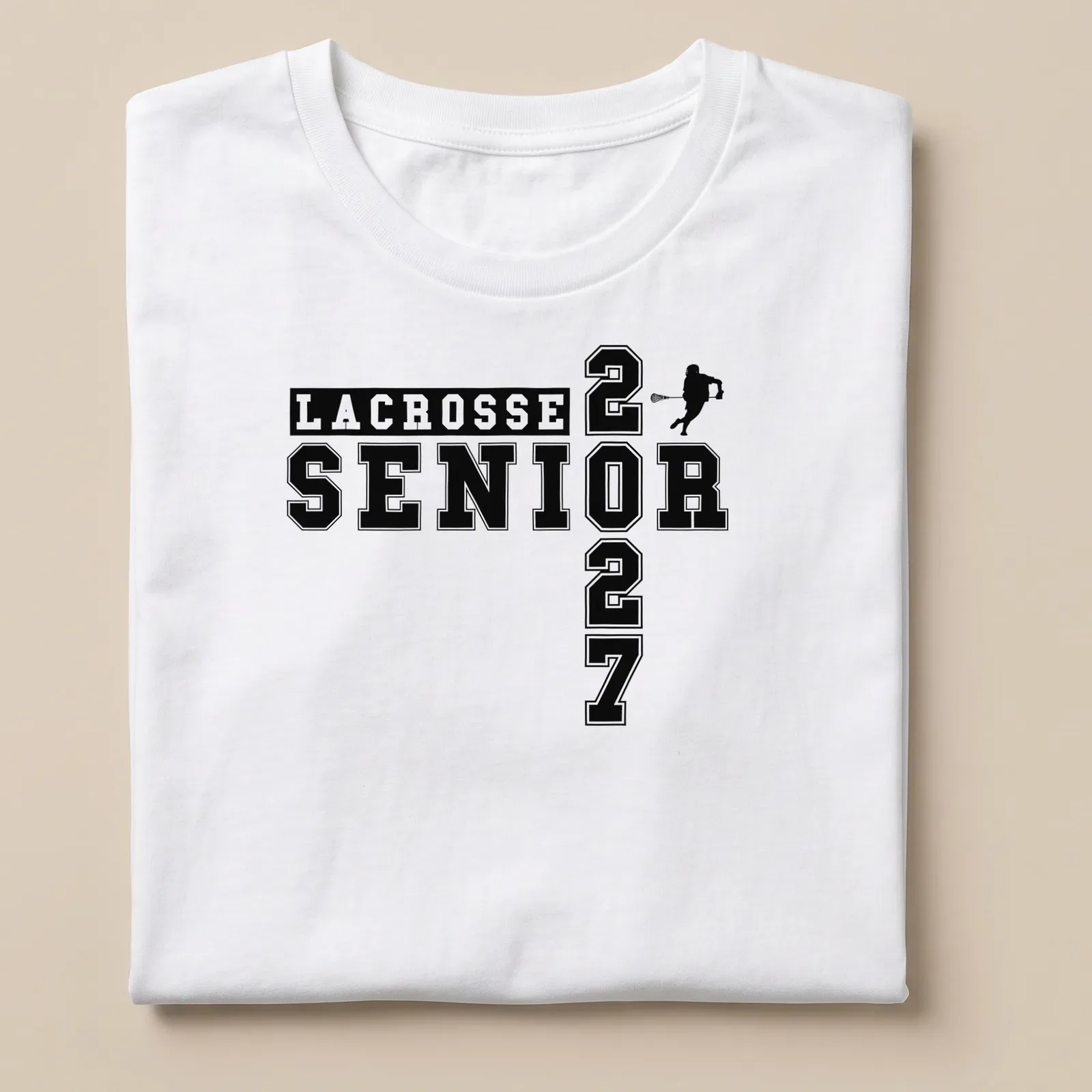 Bold collegiate Lacrosse Senior 2027 t-shirt featuring a lacrosse player in black and white — printed on a unisex t-shirt