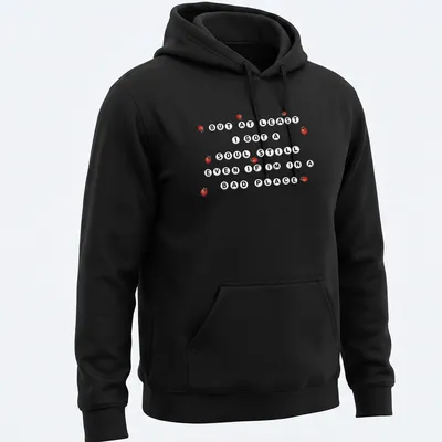 Playful ladybug graphic with humorous text about resilience. — printed on a unisex hoodie