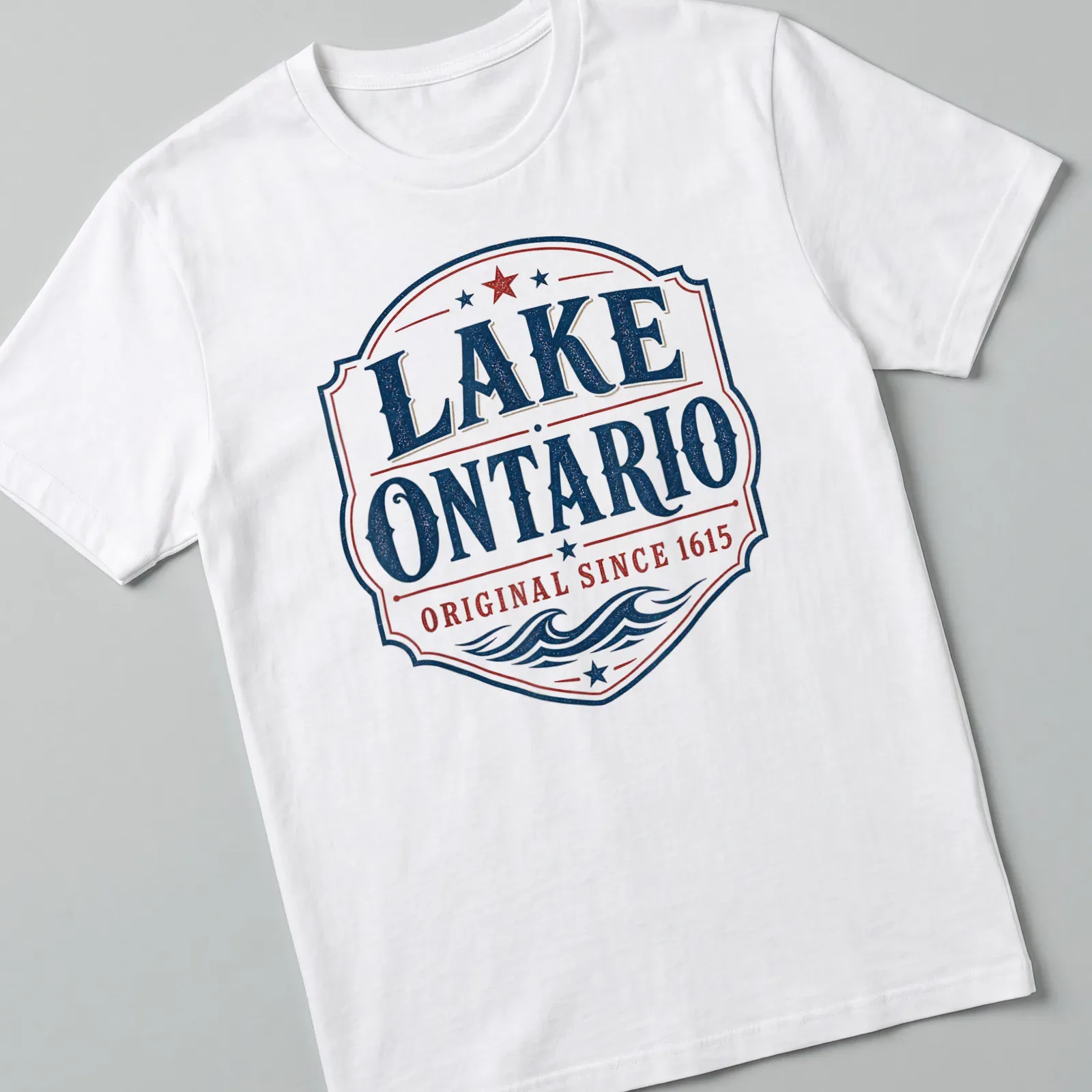 Vintage badge design featuring Lake Ontario and founding date in navy, red, and white. — printed on a unisex t-shirt