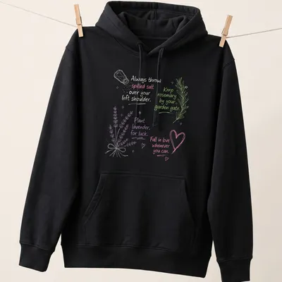 Folk art design featuring lavender, rosemary, and salt with whimsical text. — printed on a unisex hoodie