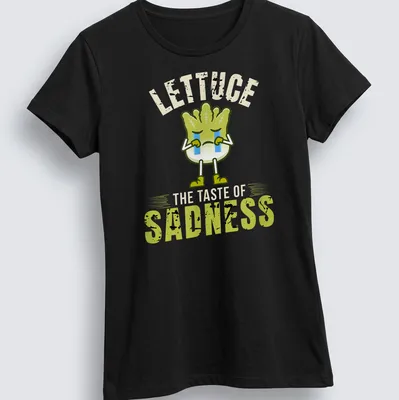 Vintage graphic tee featuring a whimsical lettuce character with humorous text. — printed on a women's shirt