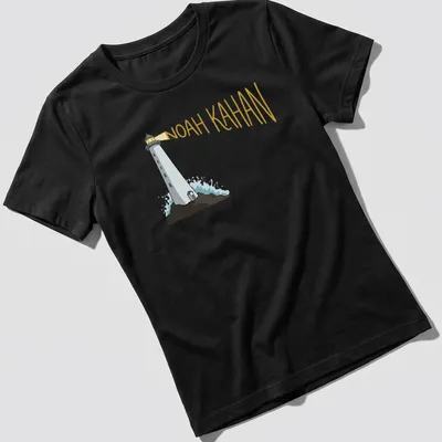 Cartoon lighthouse design with 'Noah Kahan' text in white, blue, and yellow — printed on a women's shirt