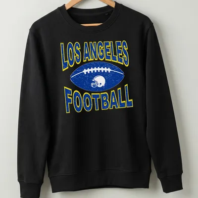 Retro distressed Los Angeles Football t-shirt with a football and helmet graphic — printed on a unisex sweatshirt
