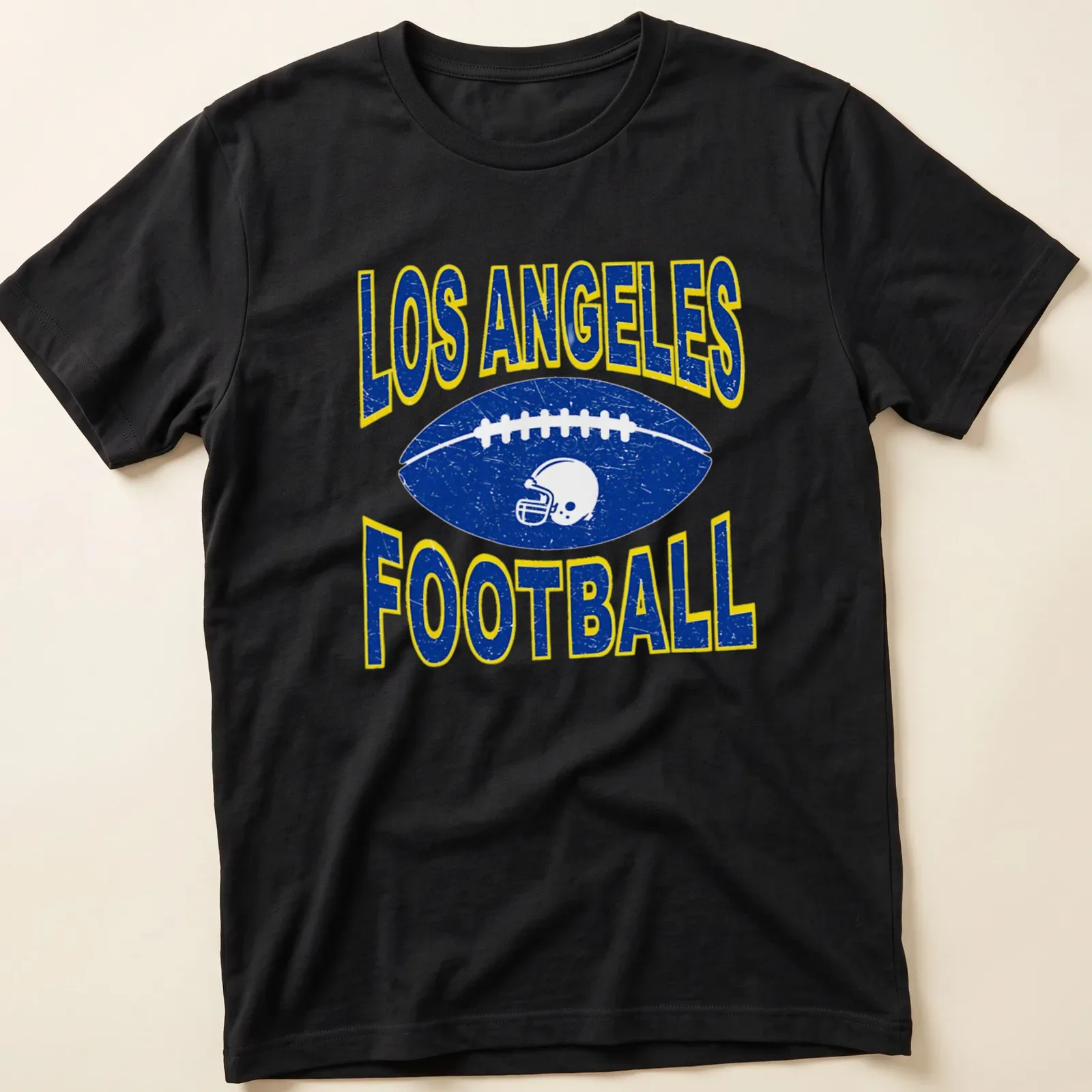 Retro distressed Los Angeles Football t-shirt with a football and helmet graphic — printed on a unisex t-shirt