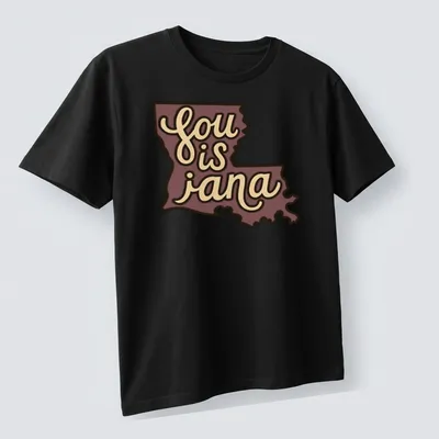 Retro Louisiana map t-shirt with printed text 'sou is jana' in purple and beige — printed on a unisex t-shirt (angled view)