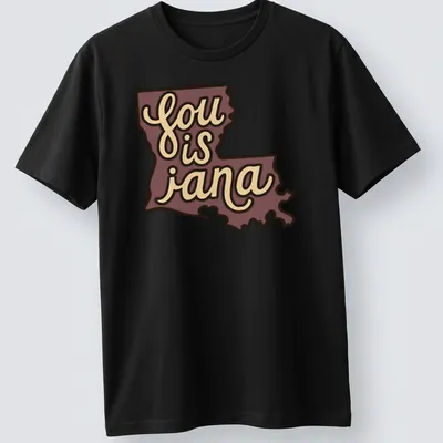 Retro Louisiana map t-shirt with printed text 'sou is jana' in purple and beige