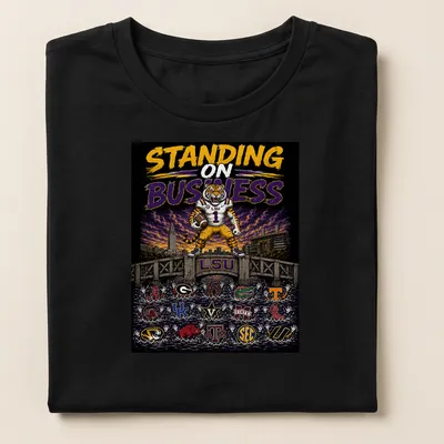 Vibrant illustration featuring LSU Tigers with bold text — printed on a women's shirt