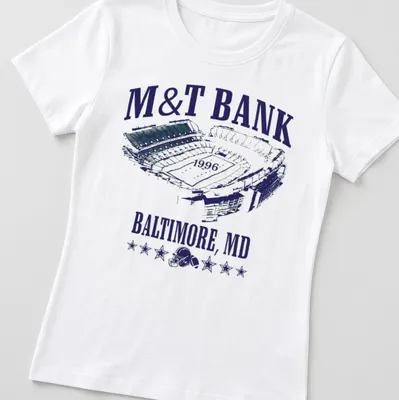 Vintage M&T Bank Stadium t-shirt with printed text in navy, white, and green — printed on a women's shirt