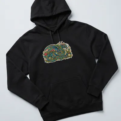 Floral dragon illustration with golden filigree in vibrant colors — printed on a unisex hoodie