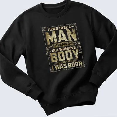 Vintage distressed tee with humorous text about identity in gold and white. — printed on a unisex sweatshirt