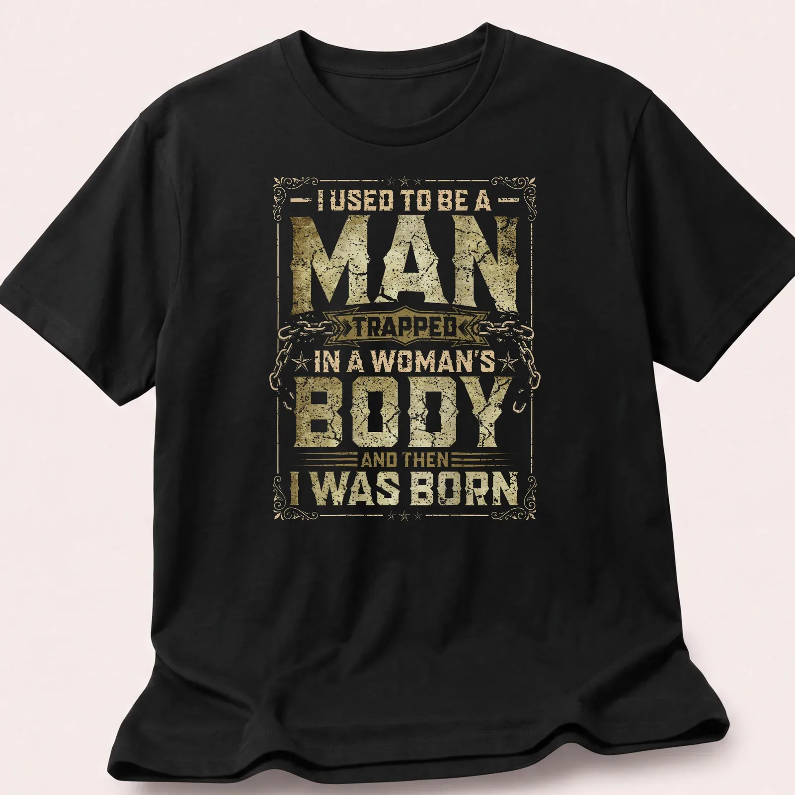Vintage distressed tee with humorous text about identity in gold and white. — printed on a unisex t-shirt