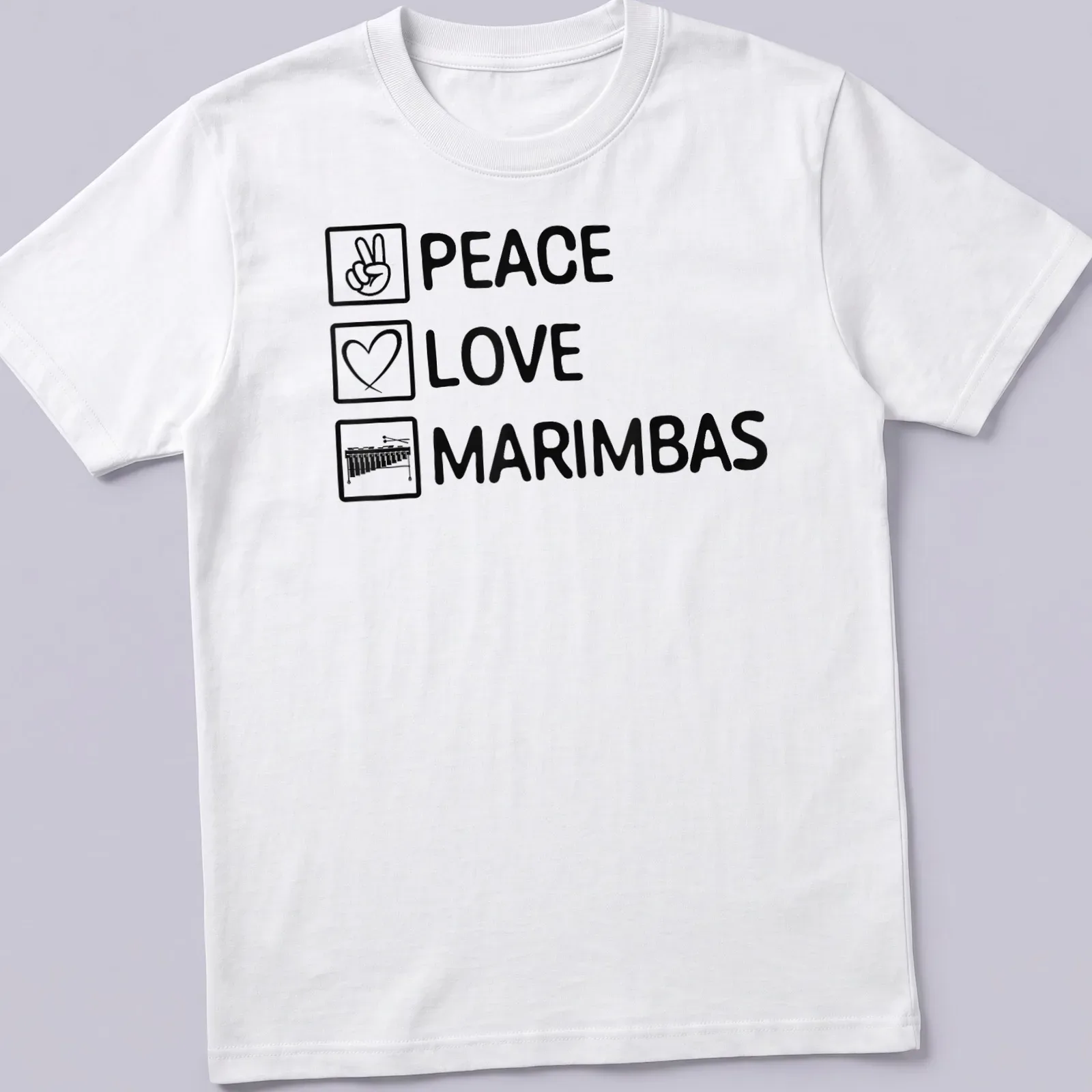Bold typography shirt featuring 'PEACE LOVE MARIMBAS' surrounded by marimba imagery — printed on a unisex t-shirt