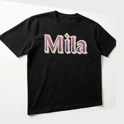 Gold glam design featuring the name Mila in pink and purple — printed on a unisex t-shirt (angled view)