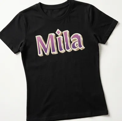 Gold glam design featuring the name Mila in pink and purple — printed on a women's shirt