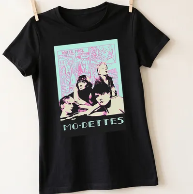 Retro comic Mo-Dettes band t-shirt featuring white mice in vibrant colors. — printed on a women's shirt