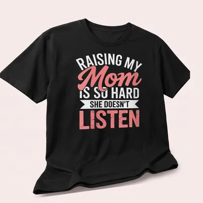 Playful script t-shirt for moms with humorous text about parenting struggles — printed on a unisex t-shirt (angled view)
