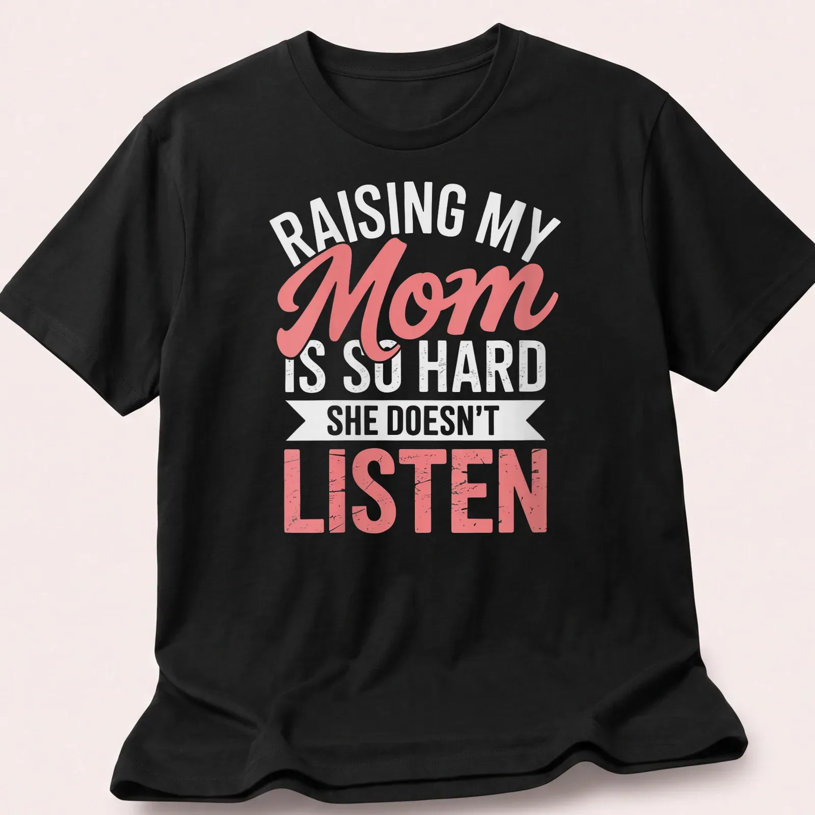Playful script t-shirt for moms with humorous text about parenting struggles — printed on a unisex t-shirt