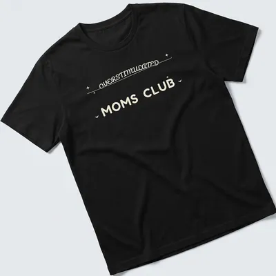 Moms Club t-shirt with 'Overstimulated Moms Club' in rounded bubble lettering on a cream background