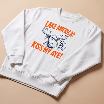 Cartoon moose with text 'LAKE AMERICA? KISS MY AYE!' in vibrant colors — printed on a unisex sweatshirt