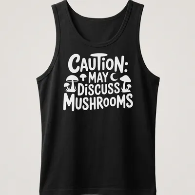 Playful typography shirt with 'Caution May Discuss Mushrooms' and whimsical mushroom illustrations — printed on a tank top