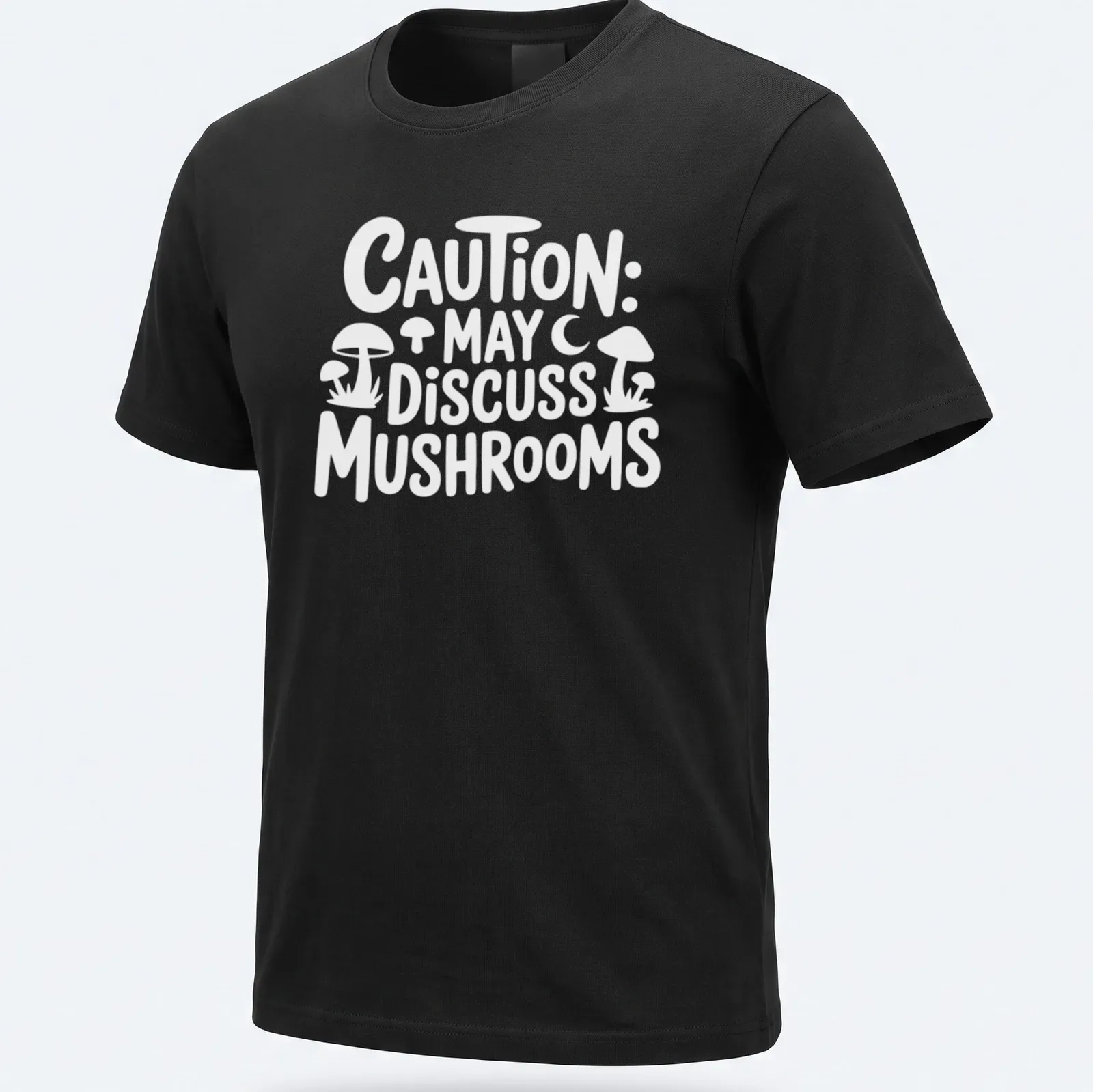 Playful typography shirt with 'Caution May Discuss Mushrooms' and whimsical mushroom illustrations — printed on a unisex t-shirt